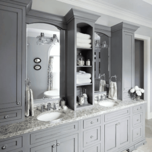 grey bathroom vanity cabinetry and storage towers